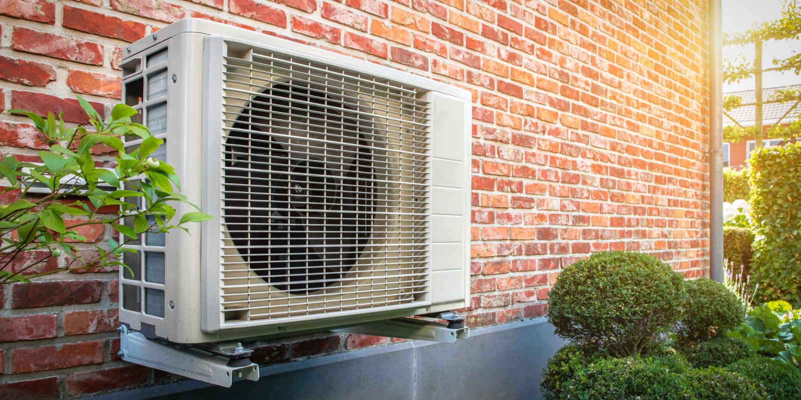 Heat pump wall mounted brick exterior